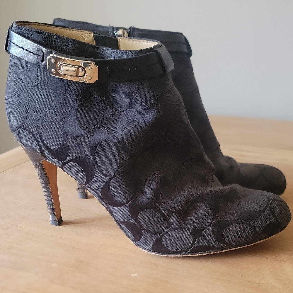 Coach Black Heeled Boots with Sleek Design